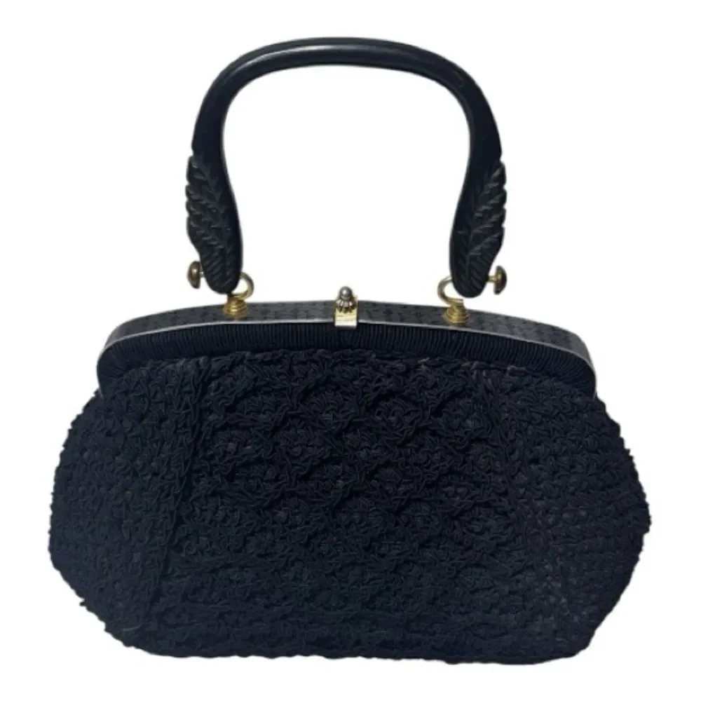 Vintage 60’s Black Knit Dumpling Bag With Silver And Gold Fixtures.